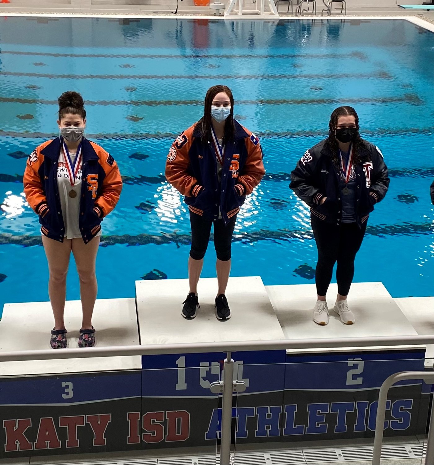 Seven Lakes’ Kailey Koval won the girls district diving title, outlasting Tompkins’ Lorenza Kabuloglu (silver) and teammate Mikayla Kaplan (bronze).